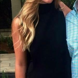 Skull cashmere turtle neck sweater with open sides